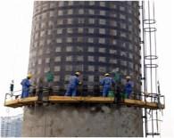 What materials should be used to reinforce the cooling tower structure?